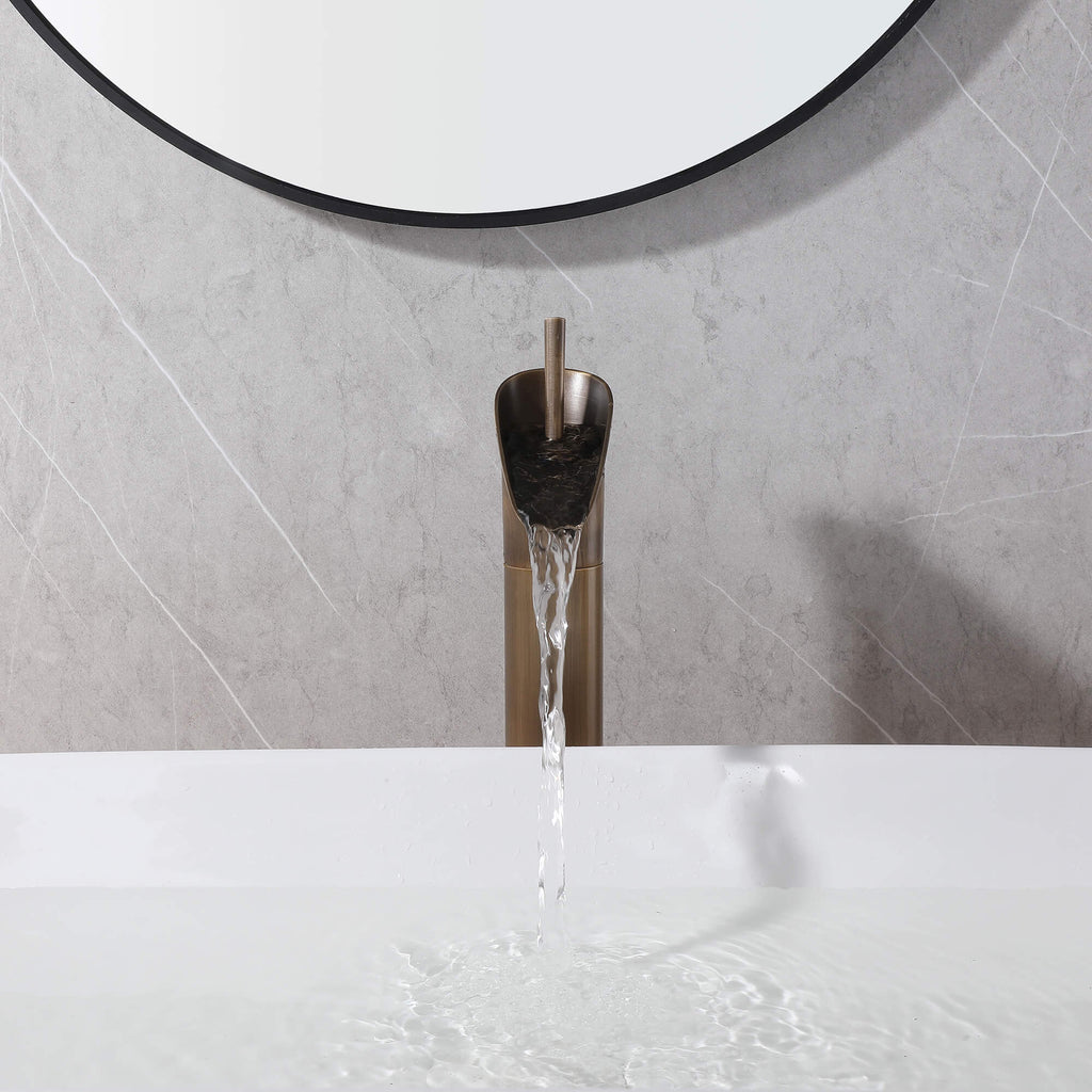 front view of vintage vessel sink faucet