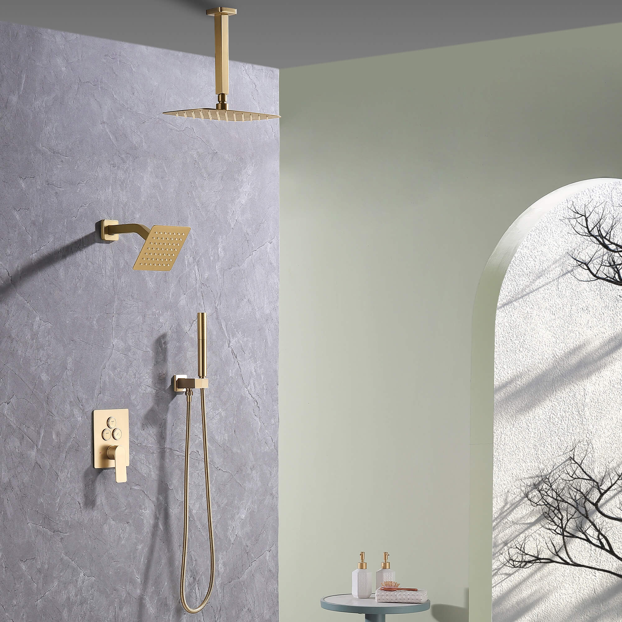 Modern bathroom with brushed gold dual shower system, including rainfall and wall-mounted shower heads with handheld spray.