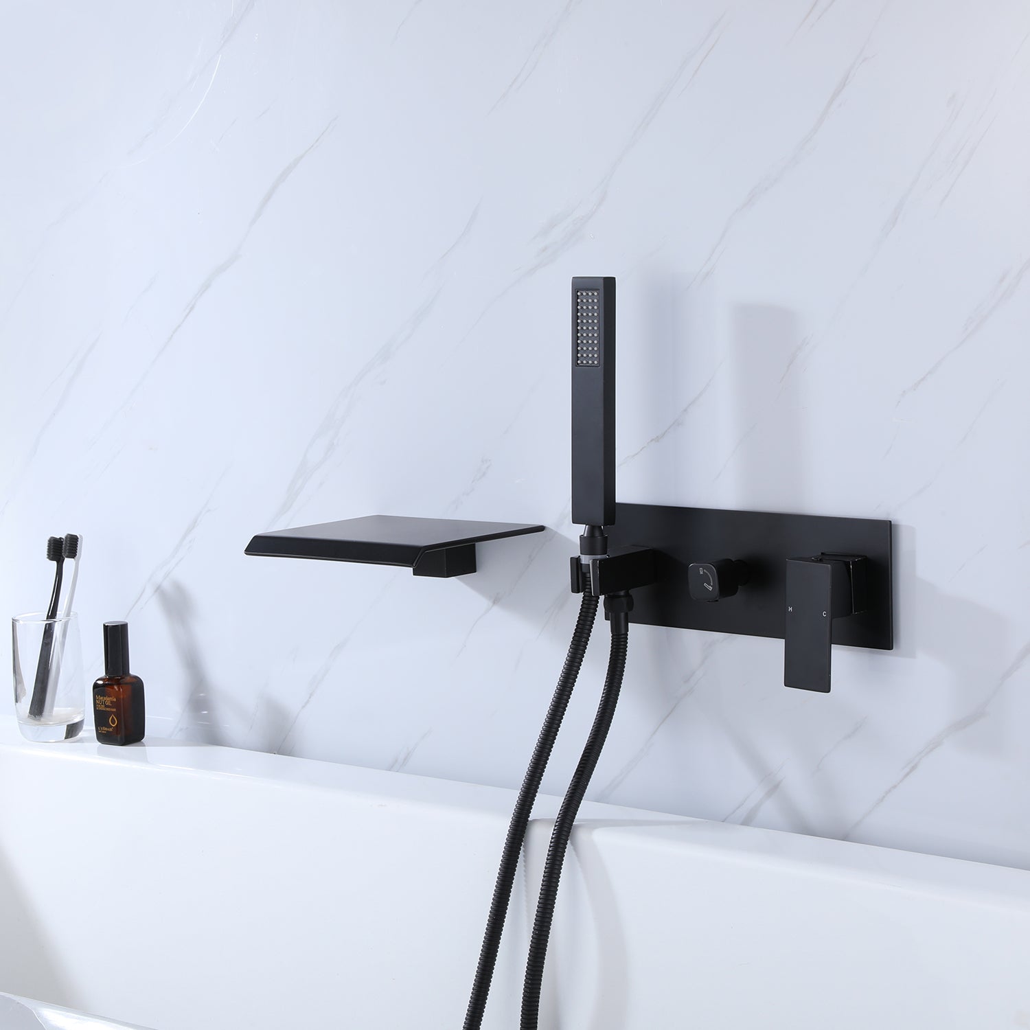 Wall-Mounted Tub Filler with Waterfall Spout and Matching Shower Wand