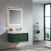 Green wall-mounted bathroom vanity with two drawers and white countertop