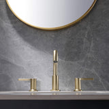 gold widespread faucet on sink