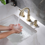 washing hand with gold bathroom faucet