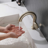 washing hand with brushed gold basin faucet