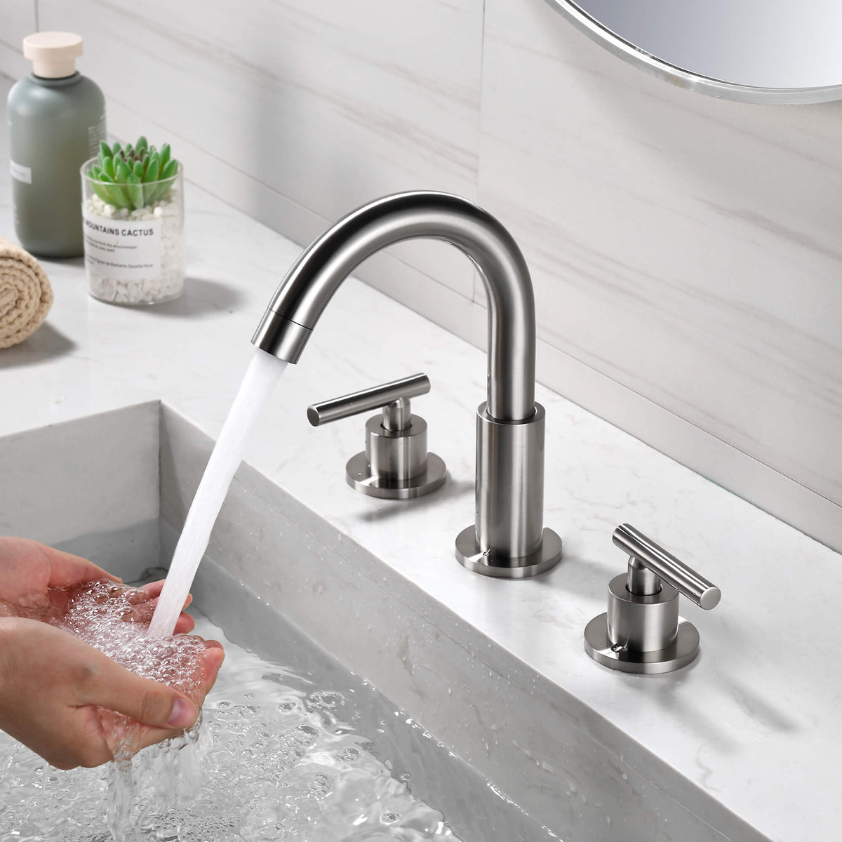 Widespread Bathroom Faucet with Dual Handles and Stainless Steel Pop-Up Drain