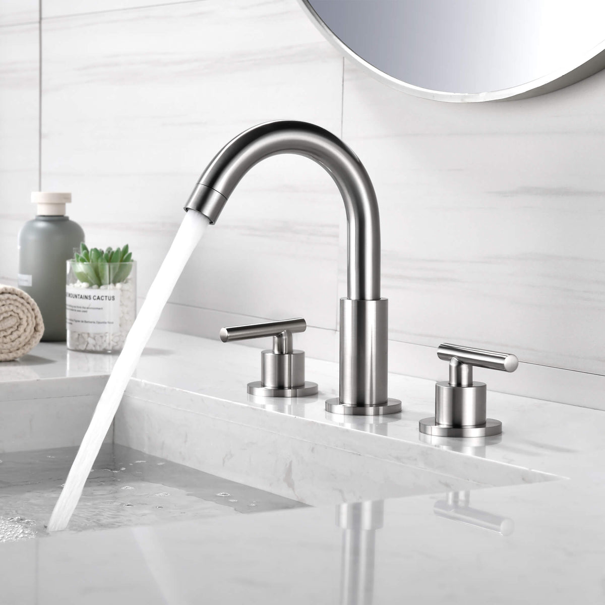 Widespread Bathroom Faucet with Dual Handles and Stainless Steel Pop-Up Drain