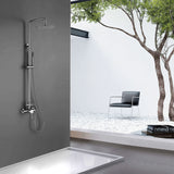 Outdoor bathroom with brushed nickel rainfall shower system and modern minimalist decor
