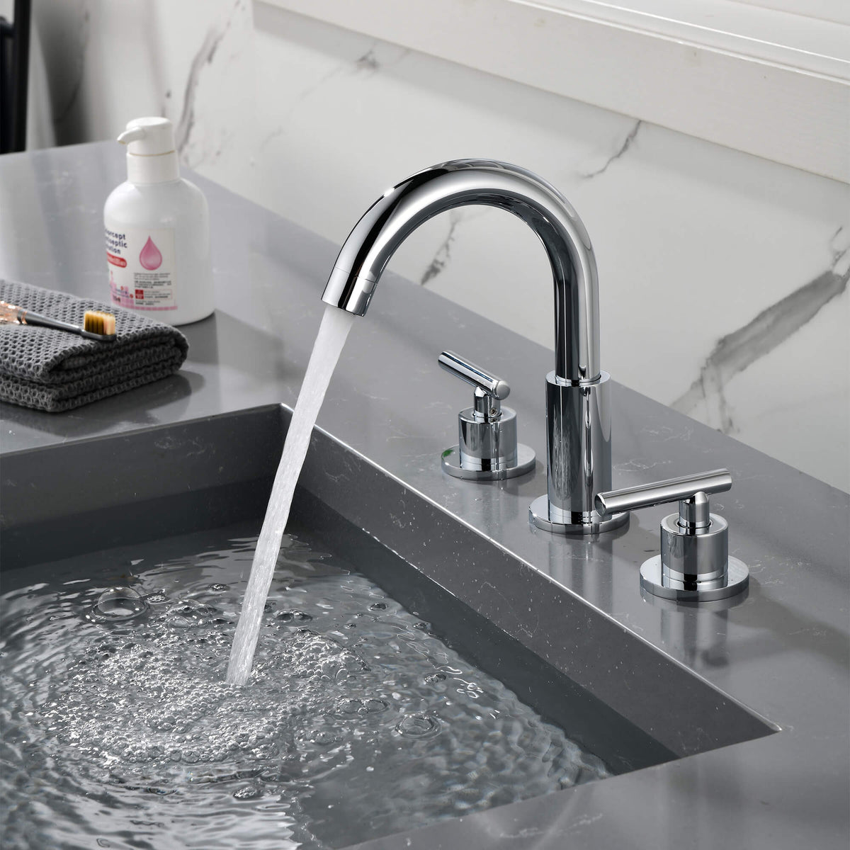 Widespread Bathroom Faucet with Dual Handles and Stainless Steel Pop-Up Drain