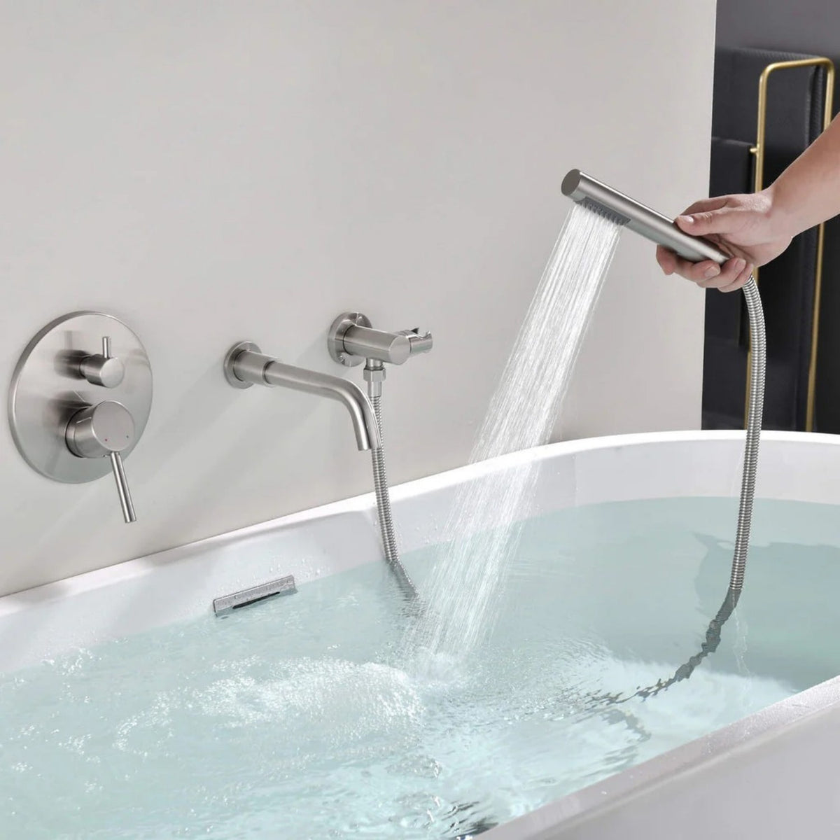 Wall-Mounted Tub Faucet with Integrated Handheld Shower