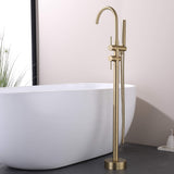 freestanding tub filler with handheld spray beside the tub