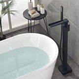 bathtub beside freestanding tub faucet waterfall