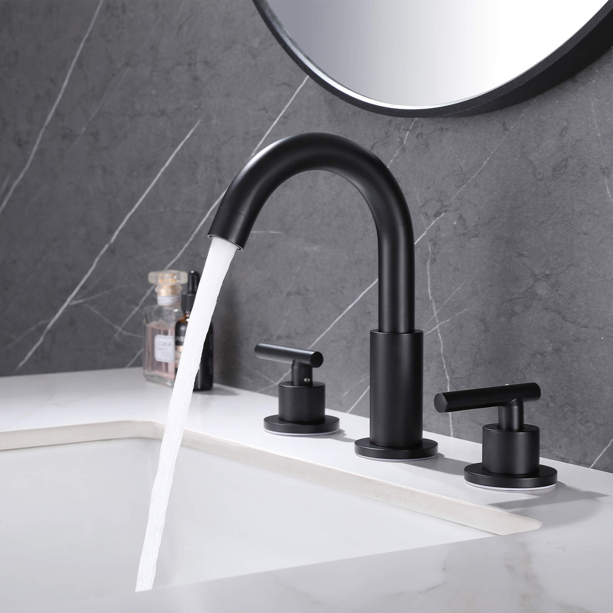 Widespread Bathroom Faucet with Dual Handles and Stainless Steel Pop-Up Drain