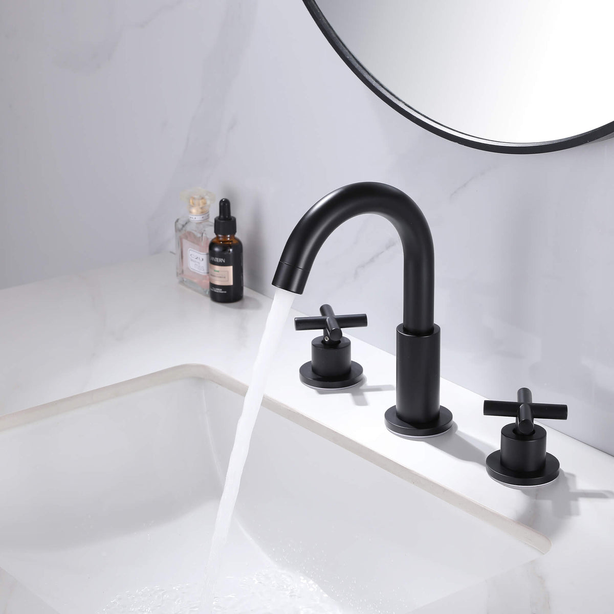 Widespread Bathroom Faucet with Dual Handles and Stainless Steel Pop-Up Drain