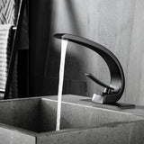 C-Shaped Sculptural Faucet with Open Lever Handle