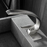 C-Shaped Sculptural Faucet with Open Lever Handle