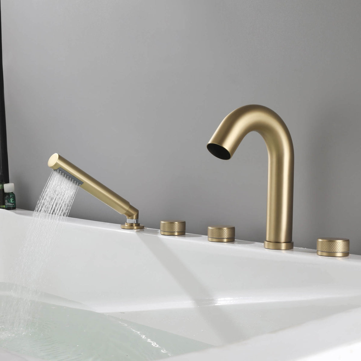 5-Hole Deck-Mount Roman Tub Faucet with Hand Shower and Swivel Tub Spout