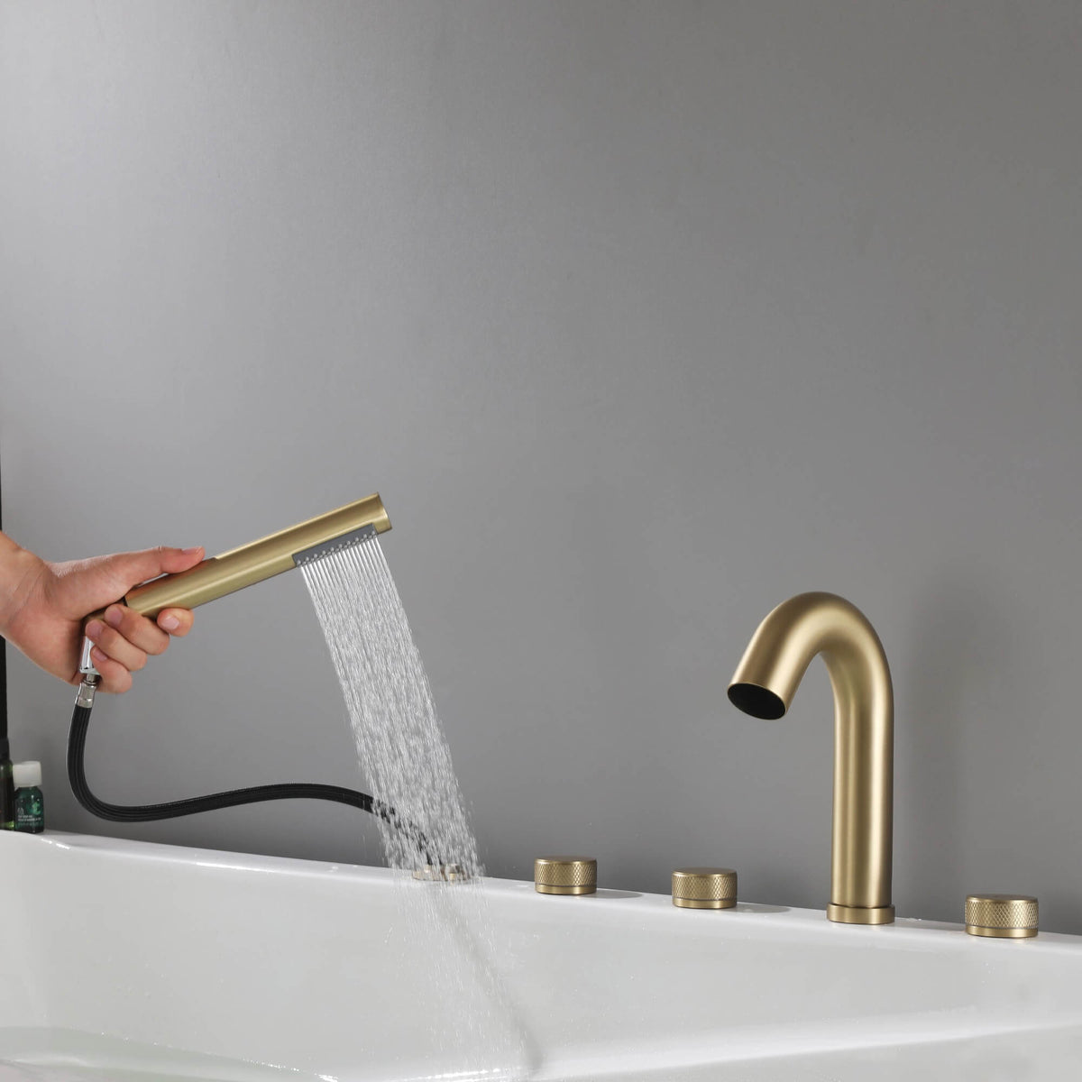 5-Hole Deck-Mount Roman Tub Faucet with Hand Shower and Swivel Tub Spout