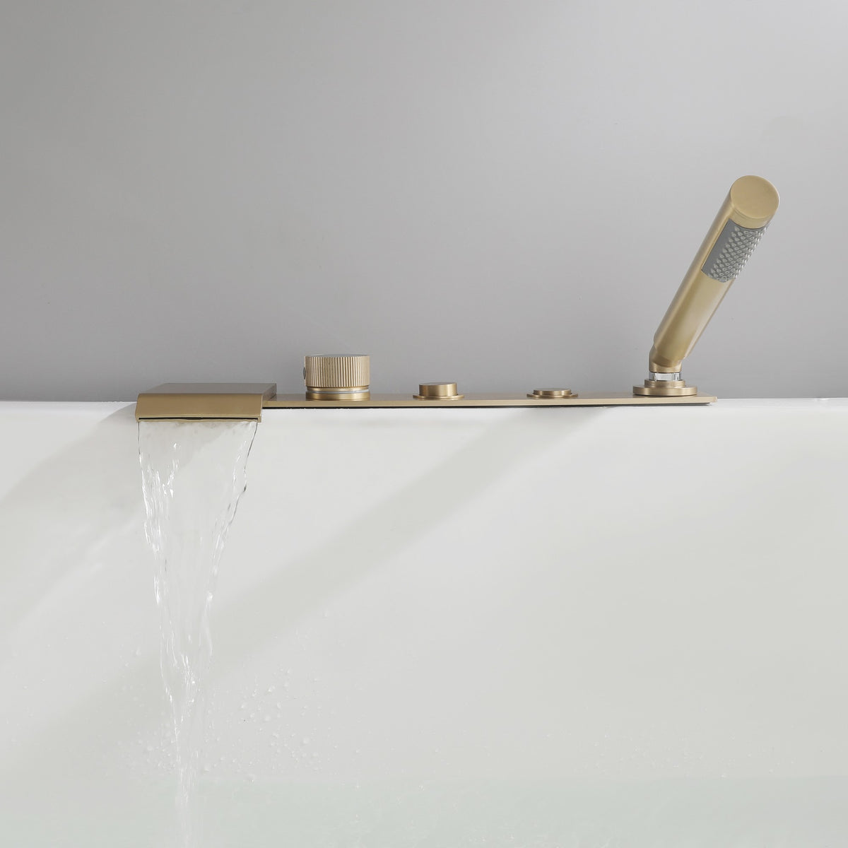 Flat Waterfall Deck-Mounted Bathtub Faucet with Textured Control Knobs and Hand Shower