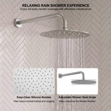 Large round rainfall head with flexible easy-clean nozzles and an adjustable joint for directing full-body water coverage