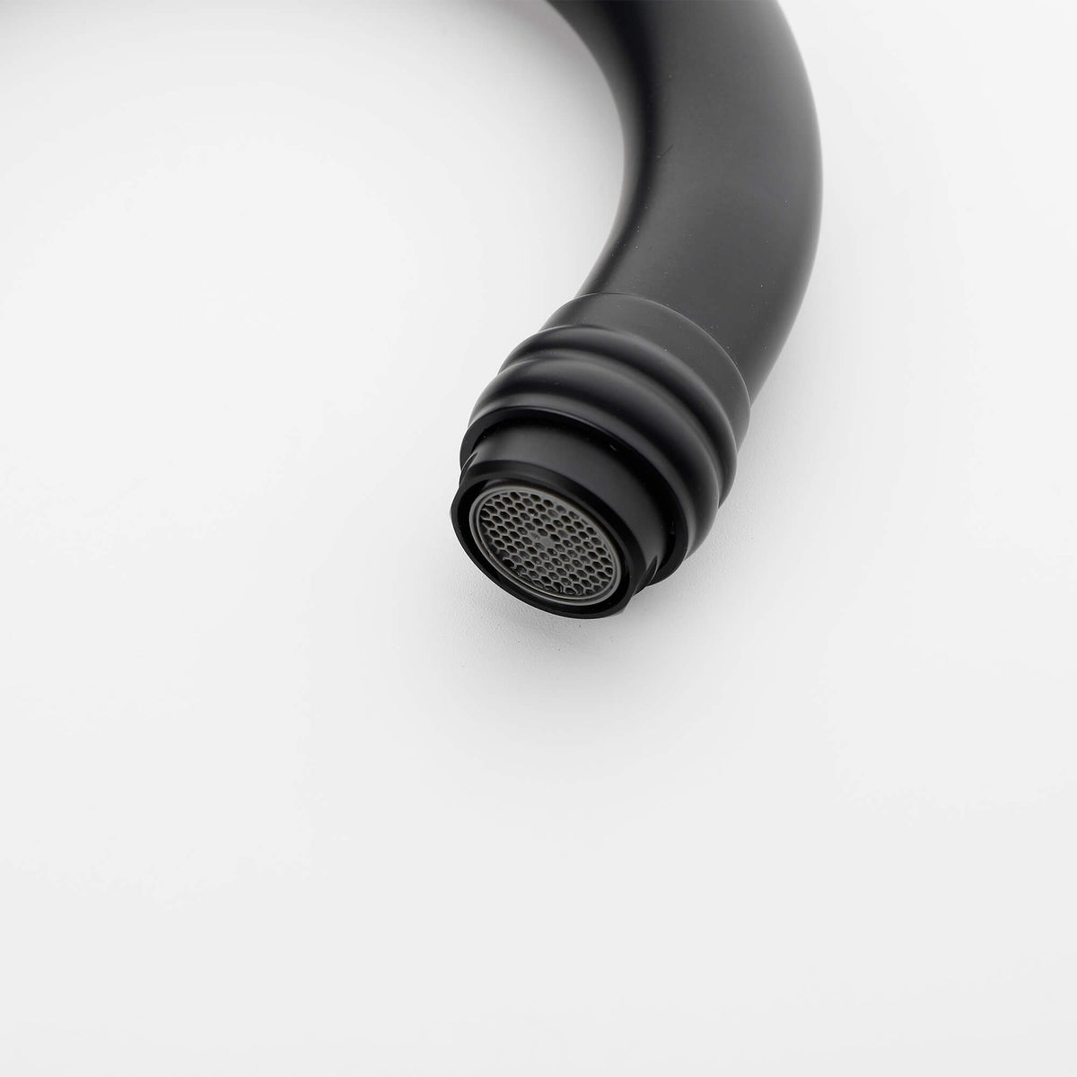 Black bathroom faucet aerator detail with water saving design