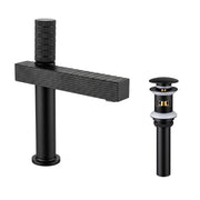 Matte black square bathroom faucet with textured spout and matching pop-up drain
