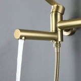 Close-up of brushed gold wall-mounted tub faucet spout with steady water flow