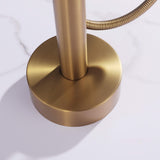 Round floor mounting base on brushed gold freestanding tub filler
