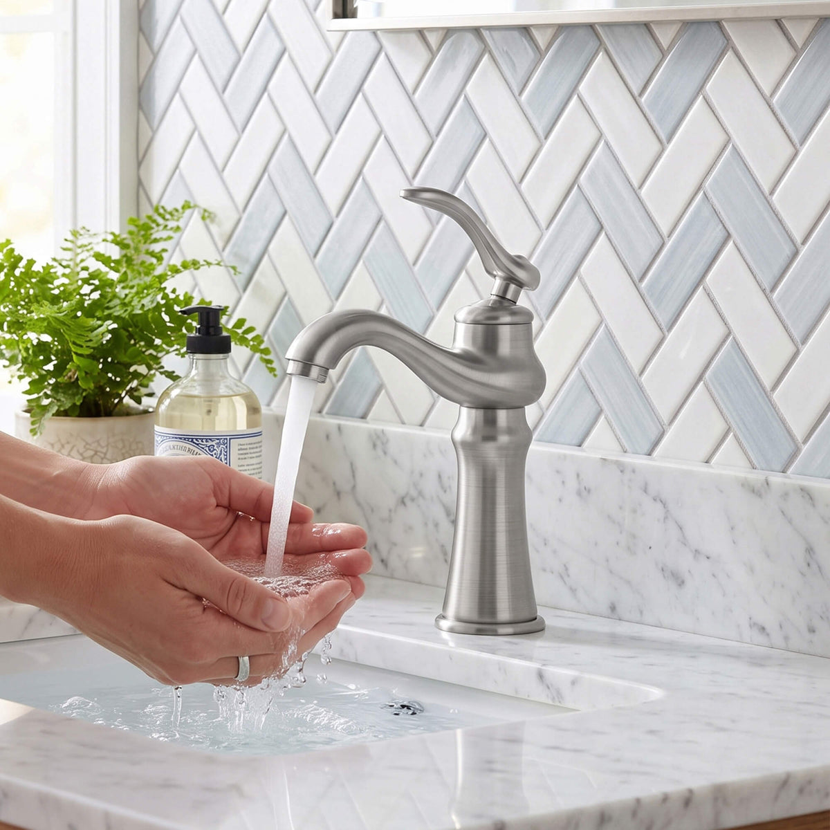 Brushed nickel bathroom faucet providing comfortable water flow for hand washing