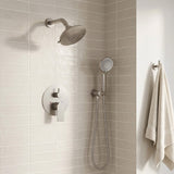 Wall-mounted dual shower set in brushed nickel with a round overhead head, handheld sprayer and concealed mixer controls
