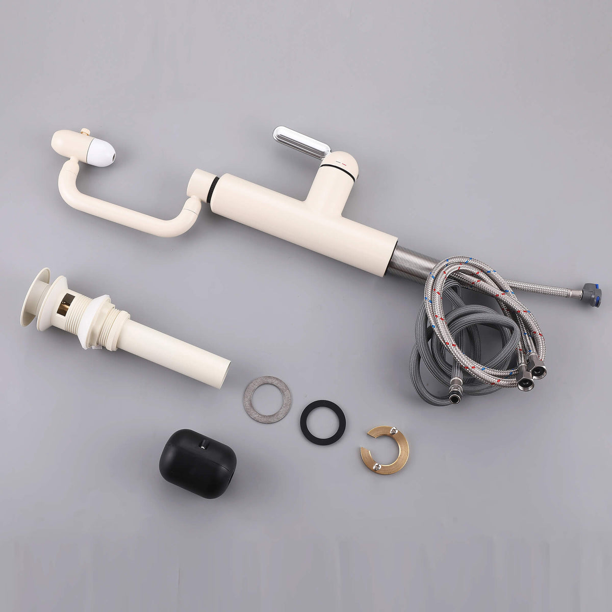 Cream white bathroom faucet parts and installation components displayed together