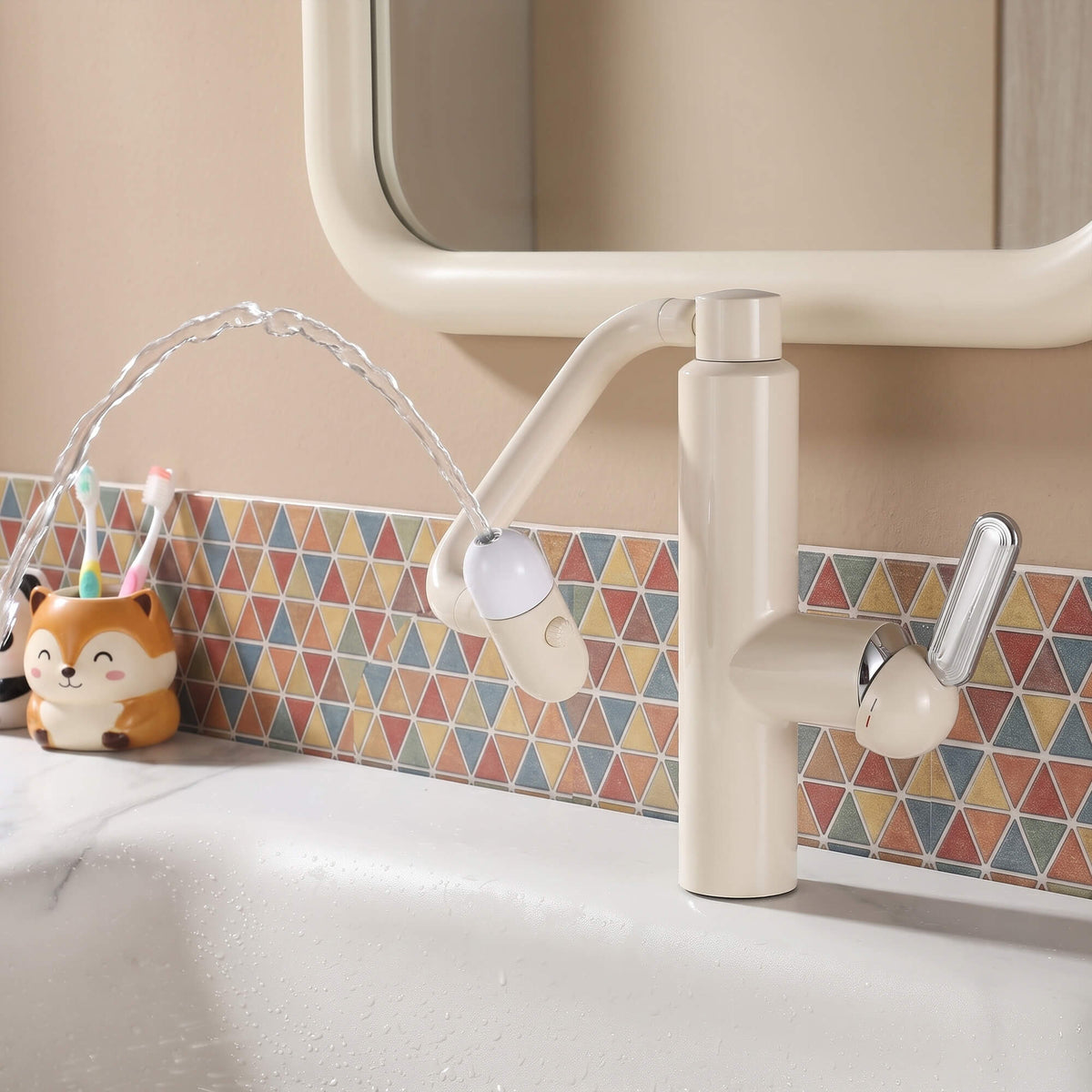 Modern bathroom faucet with flexible shower head installed on a countertop sink for daily washing