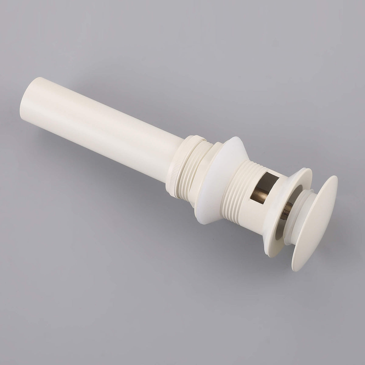 Cream white bathroom sink drain component detail