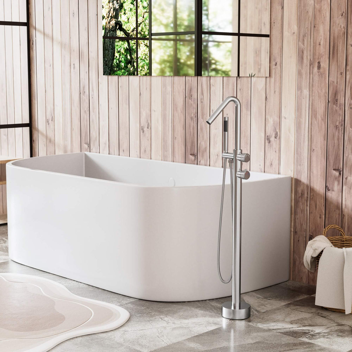 Floor mounted outdoor tub filler installed beside a freestanding bathtub in a modern bathroom setting