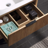 Fluted bathroom vanity drawer with divided storage compartments