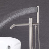 Handheld shower on brushed nickel freestanding tub filler delivering a wide rinsing spray