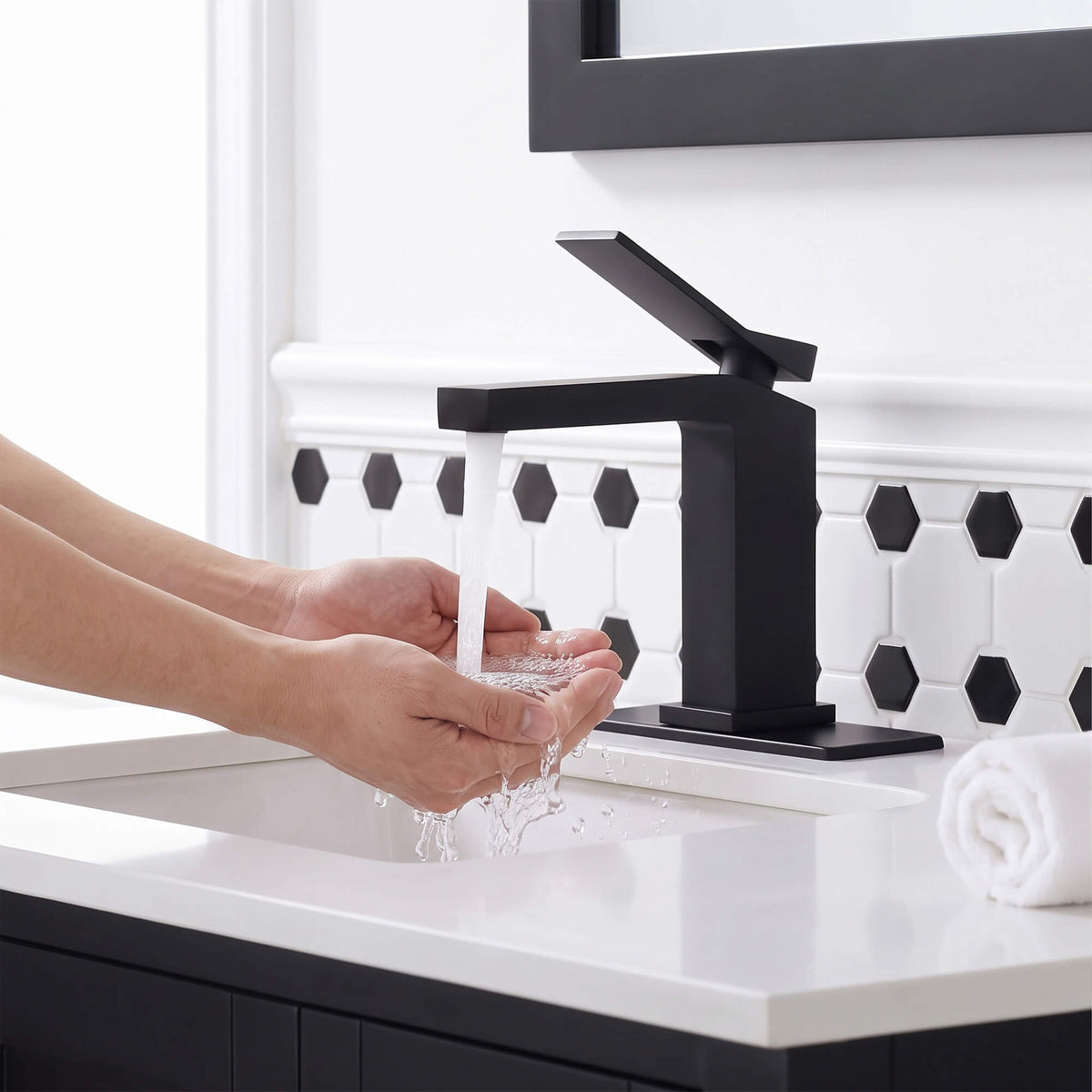 Modern matte black bathroom faucet providing comfortable water flow for daily hand washing