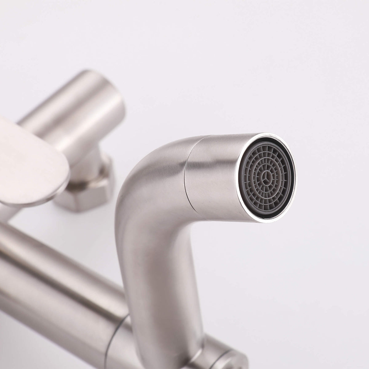 Detail of the JK0561 brushed nickel outdoor shower tub spout with a built-in aerator.