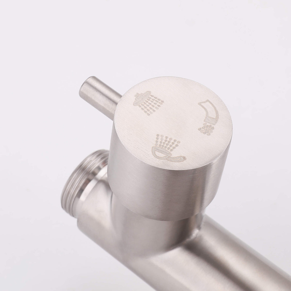 Close-up of the JK0561 outdoor shower diverter knob with engraved icons for selecting different water outlets.