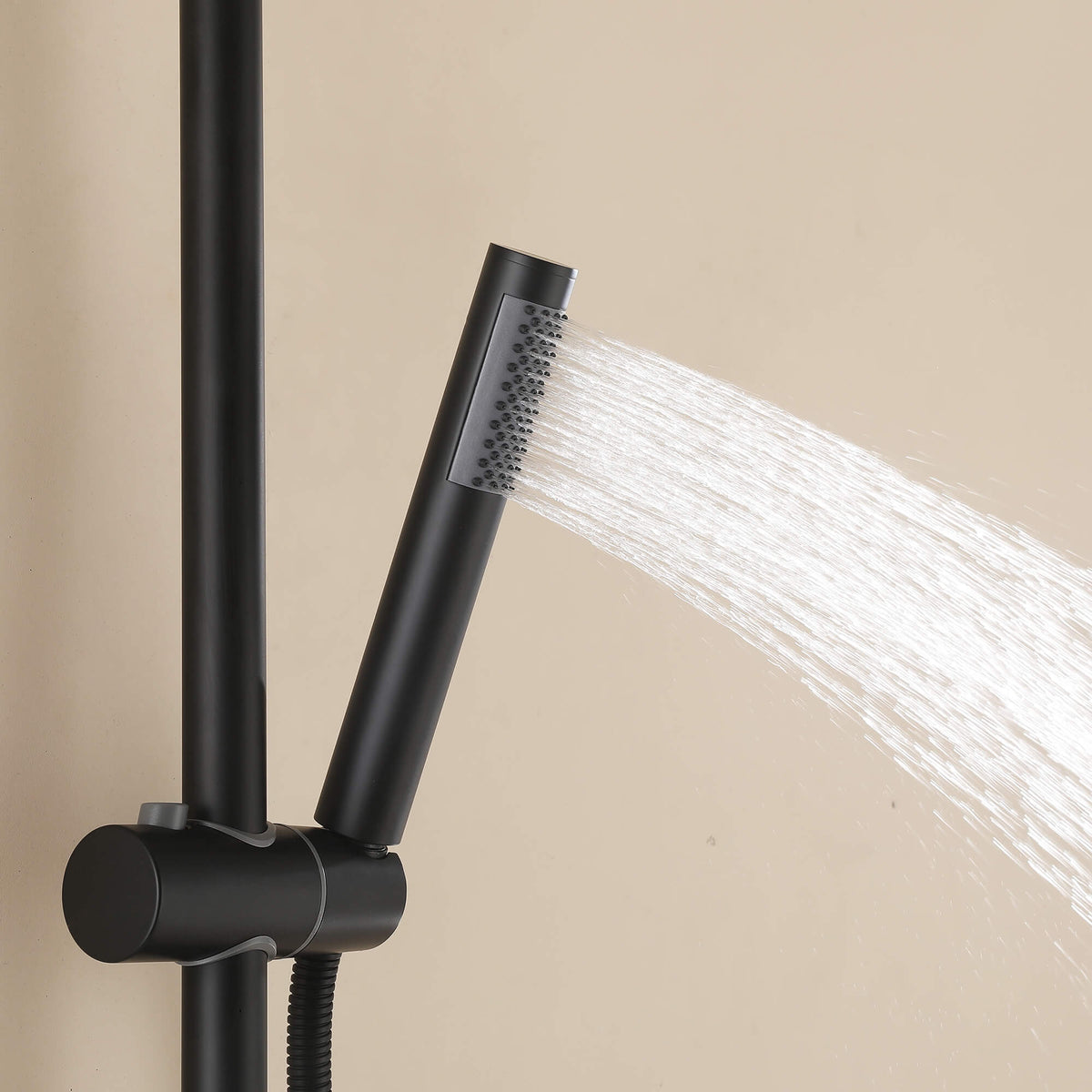 Matte black handheld shower sprayer with a wide water spray on the JK0562 wall-mounted outdoor shower system.