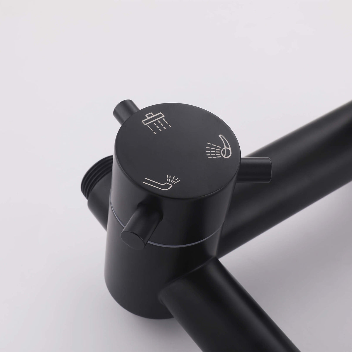 Close-up of the JK0565 shower diverter control with icons for selecting different water outlets.
