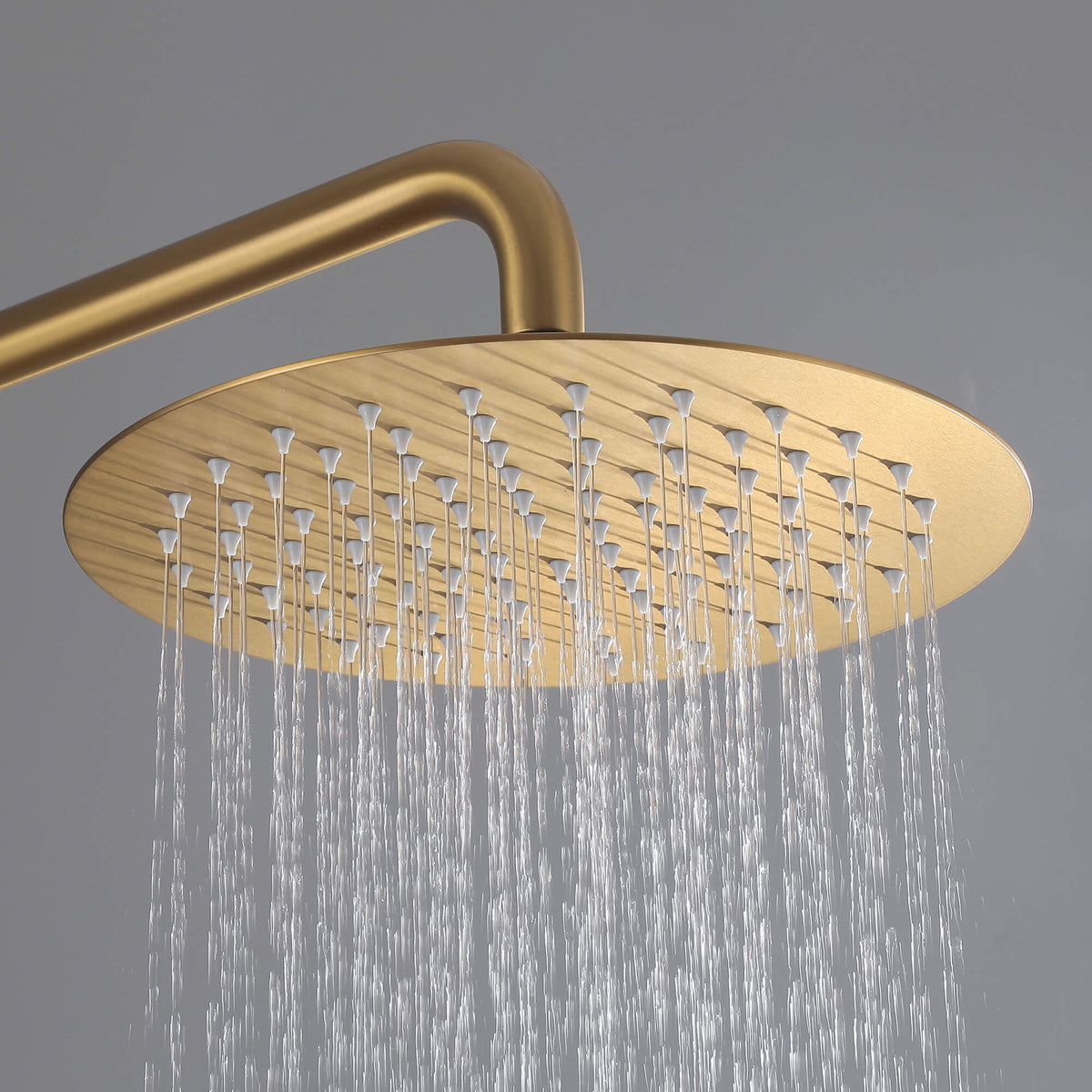JK0566 brushed gold rainfall shower head delivering a wide, even stream of water for outdoor showering