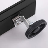 Matte black linear shower drain adjustable leveling feet detail