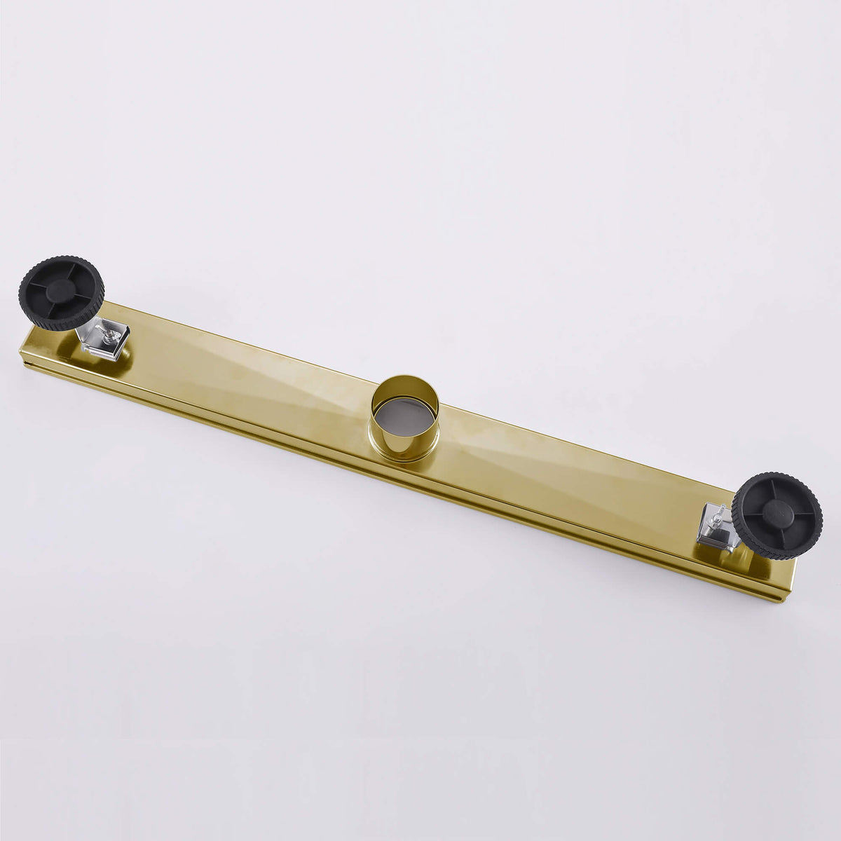 Brushed gold linear shower drain backside with adjustable leveling feet