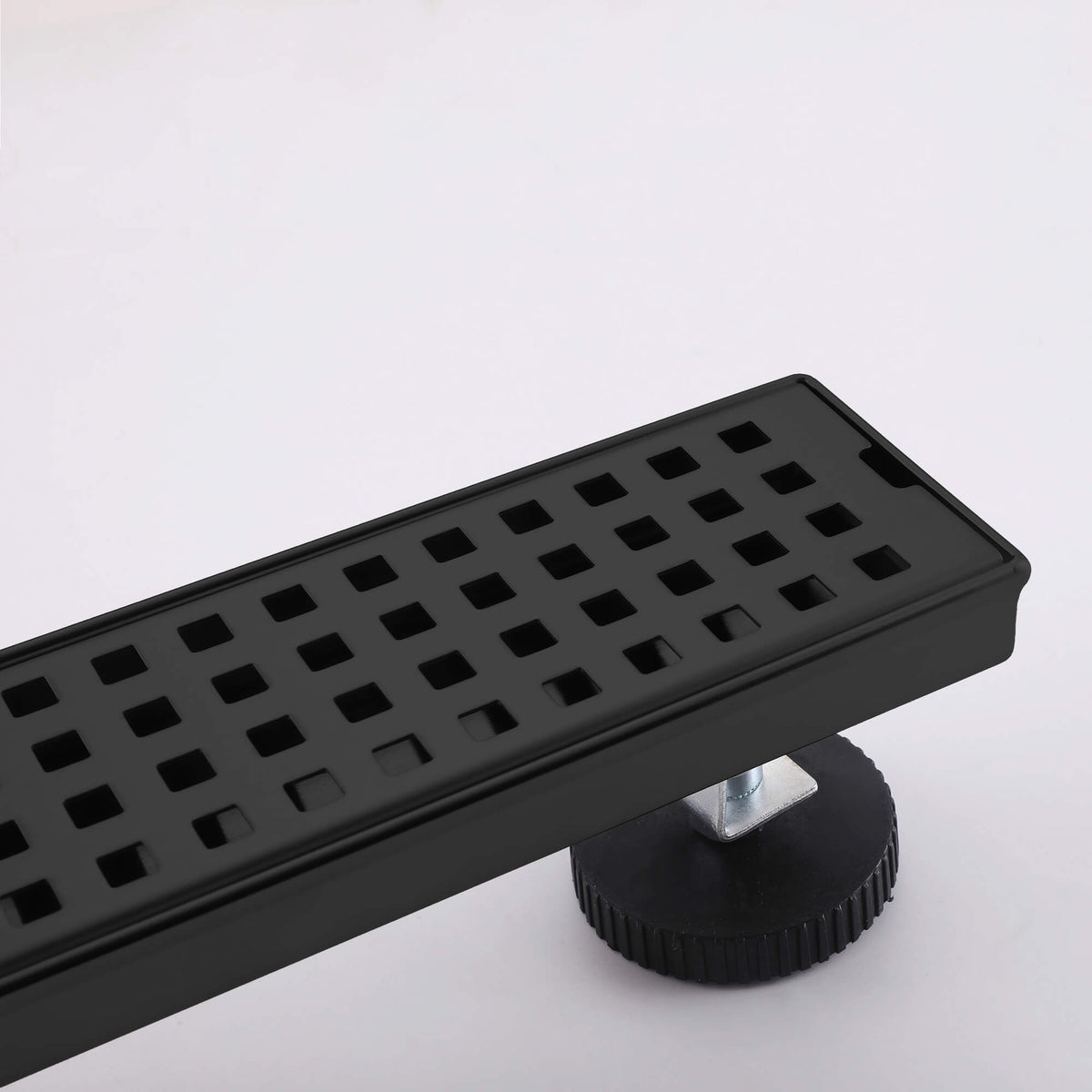 Matte black linear shower drain square grate detail matte black finish