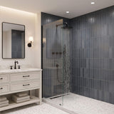 Matte black rainfall shower system with overhead shower water flow in a contemporary bathroom