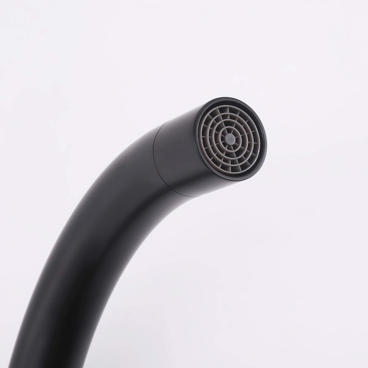 Close-up of matte black freestanding bathtub faucet spout with aerator