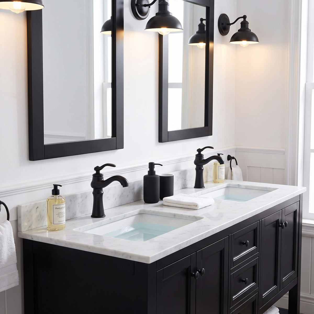 Matte black vanity faucet featured in a modern double sink bathroom design