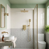 Modern bathroom with brushed gold rain shower system, handheld shower and concealed mixer valve