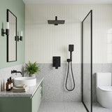Modern bathroom with matte black rain shower system, concealed mixer valve and handheld shower