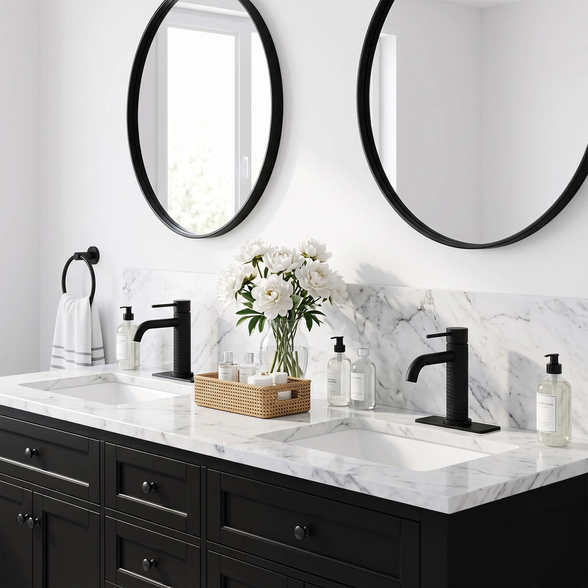 Modern matte black bathroom faucets installed on double vanity sink with contemporary bathroom design