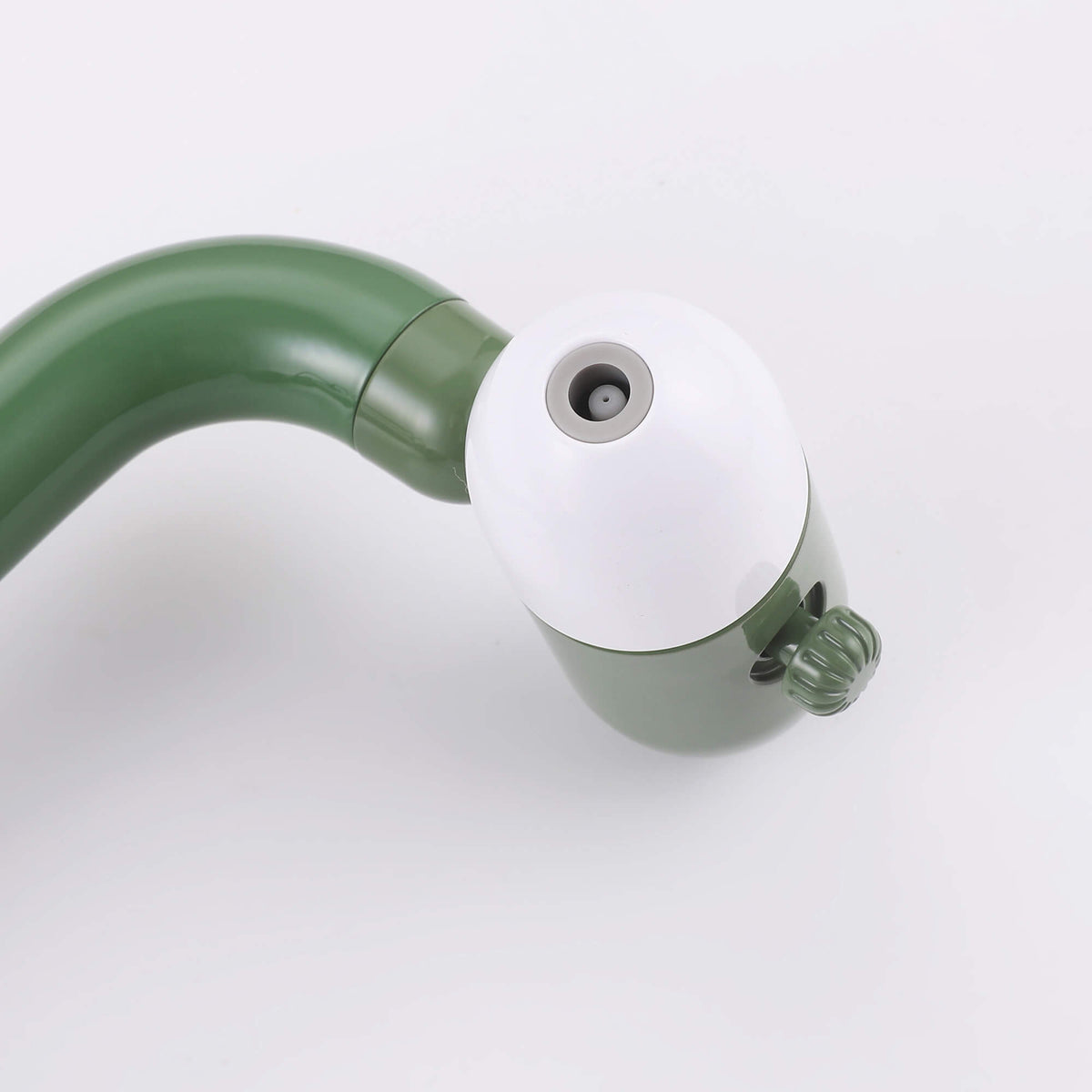 Close-up of olive green faucet spray head with adjustable nozzle design